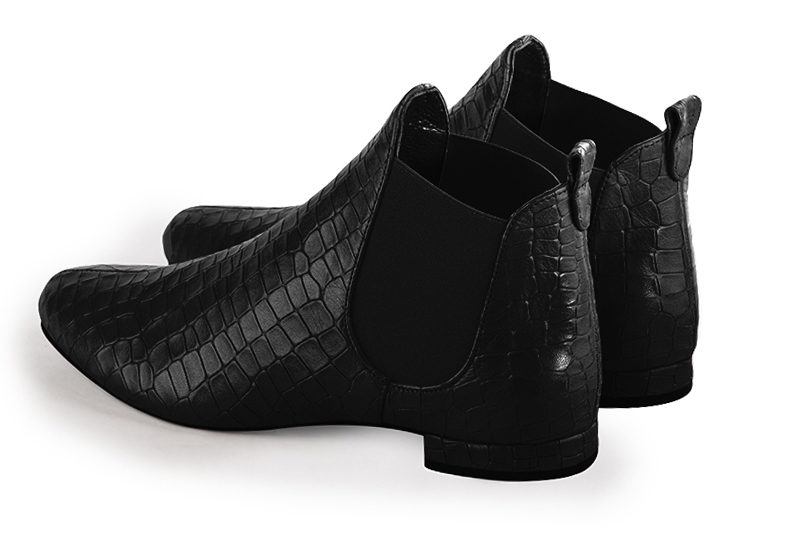 Satin black women's ankle boots, with elastics. Round toe. Flat block heels. Rear view - Florence KOOIJMAN